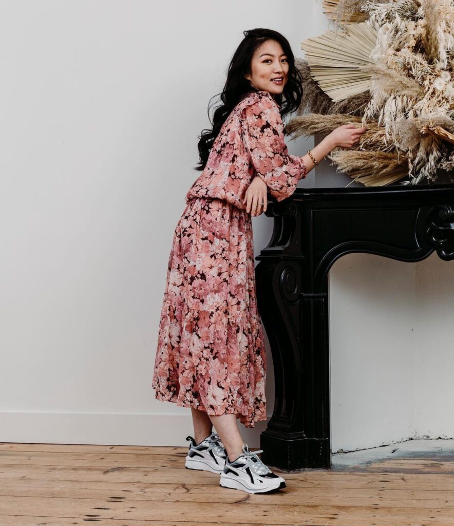 Chunky sneakers with a flower dress