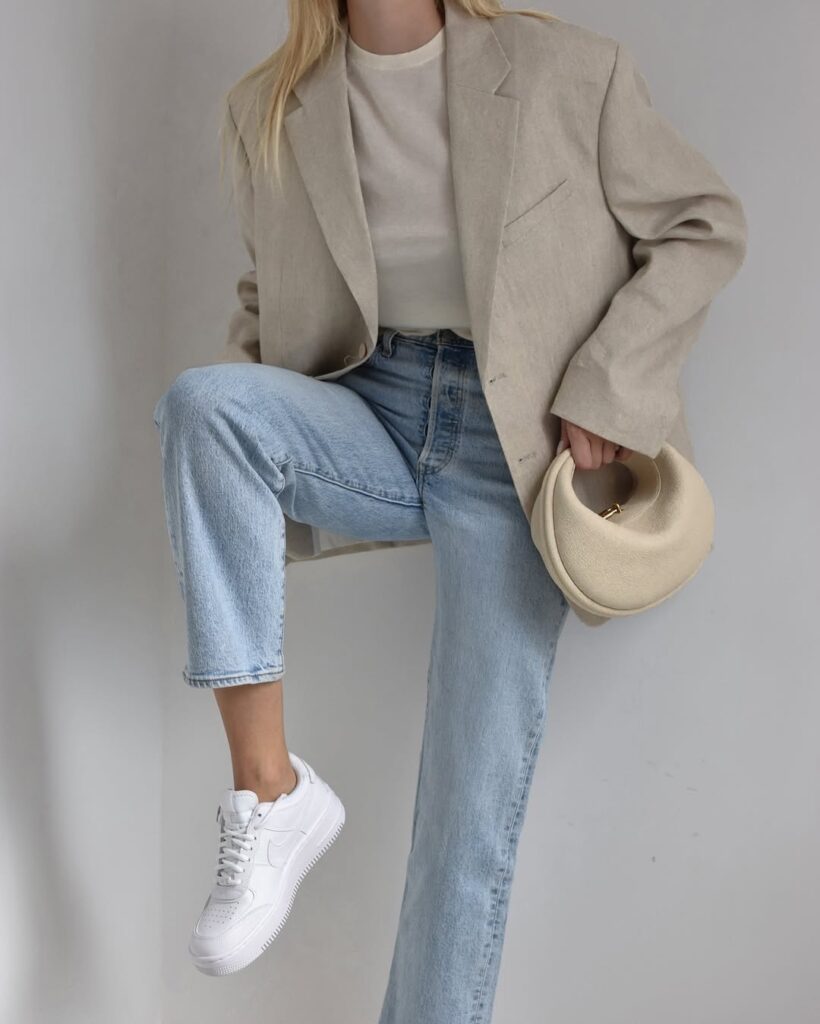 Classic white sneakers with light denim