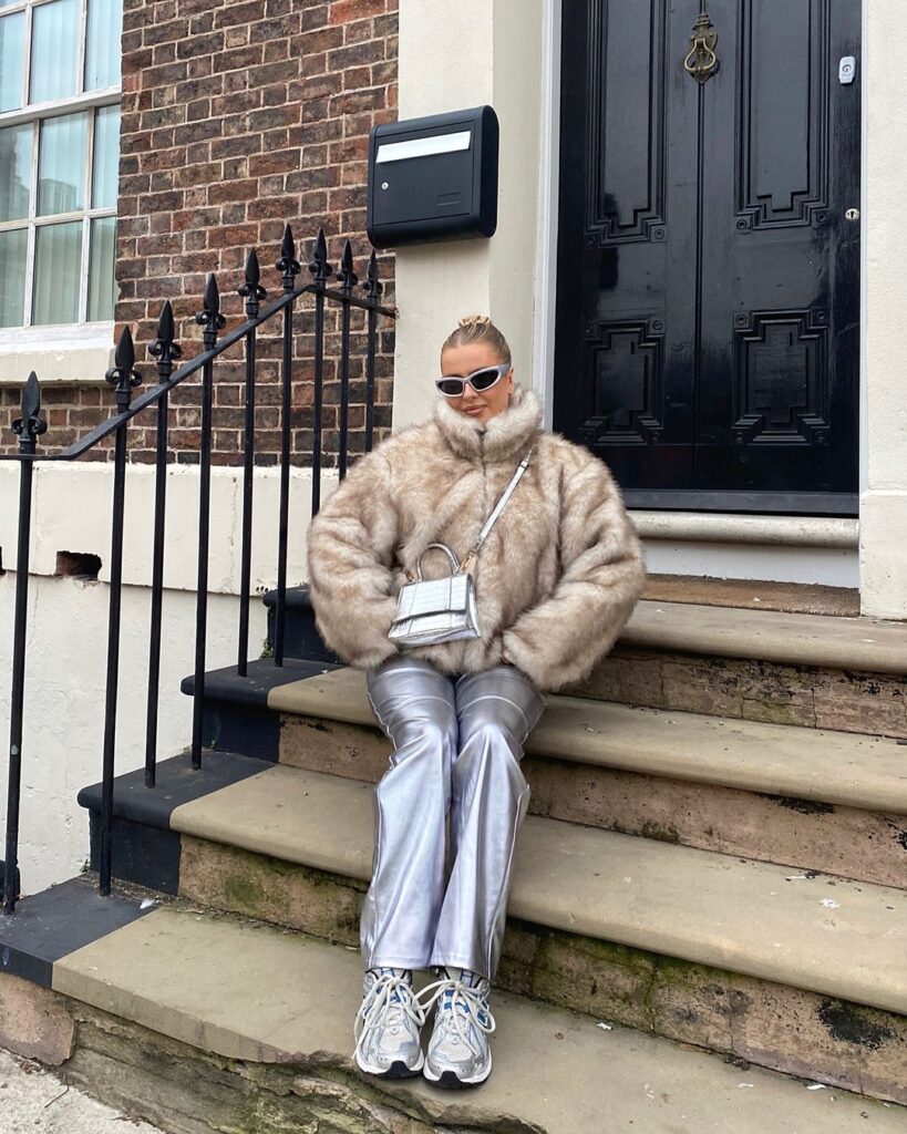 Metallic trousers and fur jacket