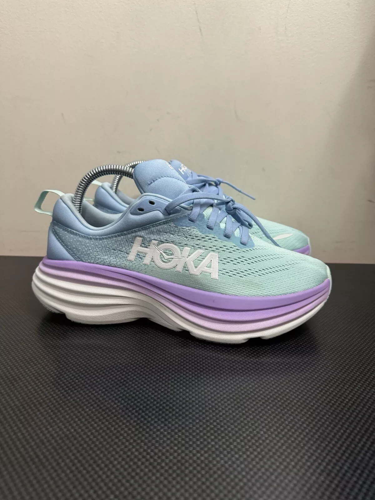 Sunlit ocean Hoka Bondi 8s