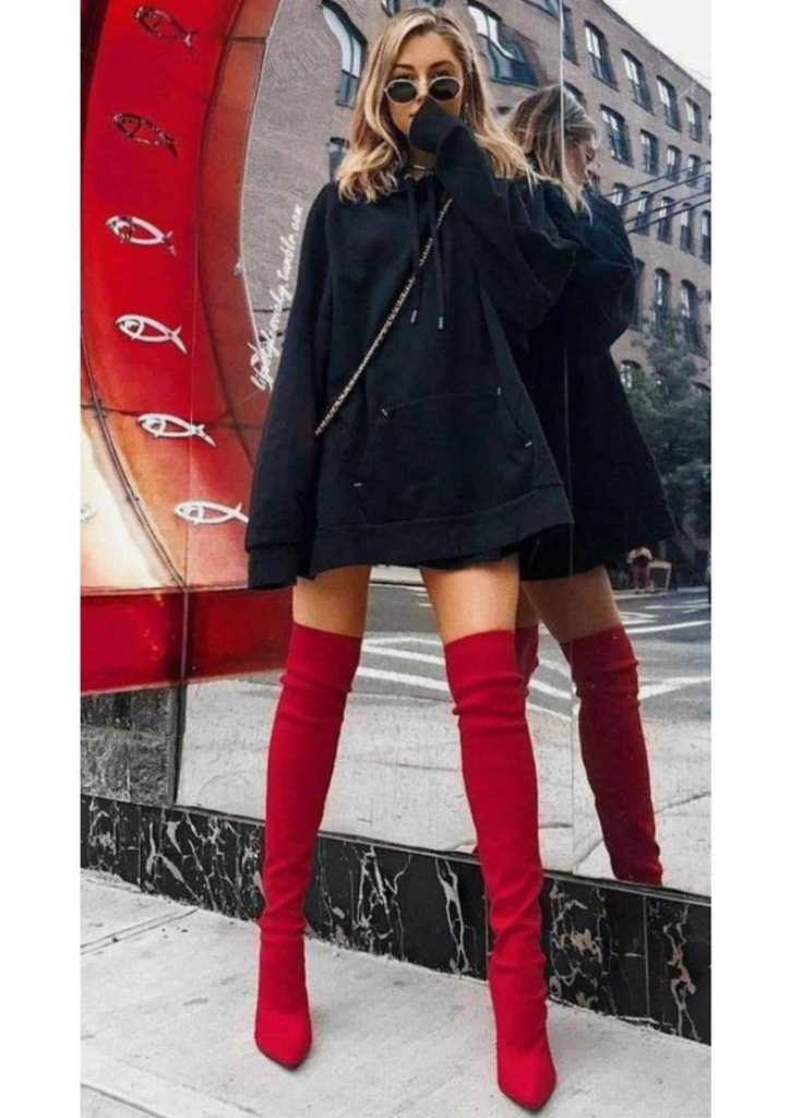 10. Oversized Hoodie and Bold Red Boots