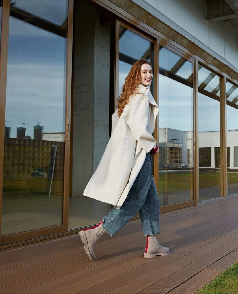 Cream Coat and Loose Jeans with Neutral Ankle Boots