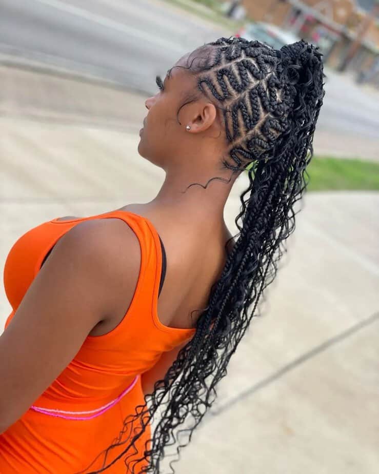 3. Zigzag cornrow braids with a curly ponytail