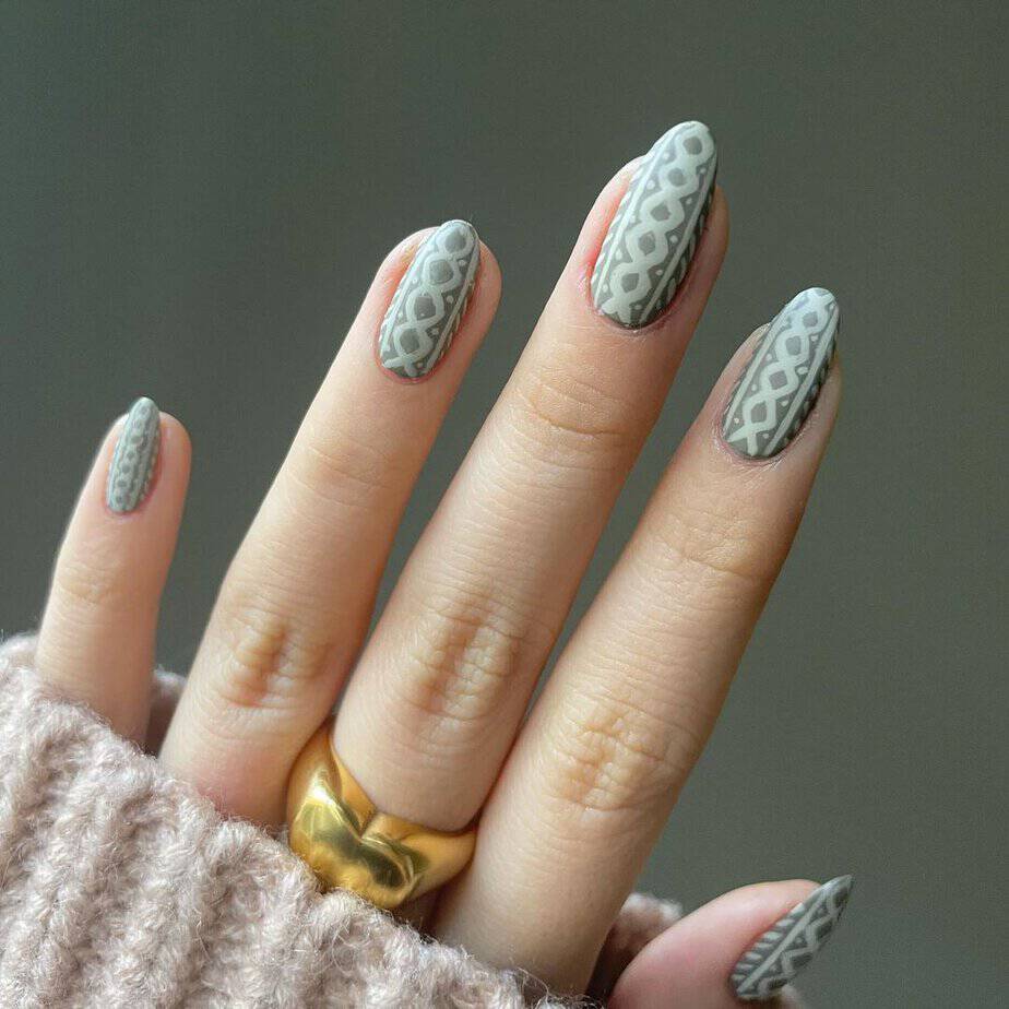 Cable knit sweater nails